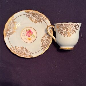Elegant Gold and White Tea Cup and Saucer Set